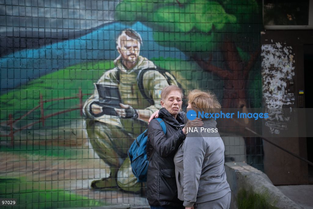KYIV, UKRAINE, SEPTEMBER 26, 2026: Firefighters work at a five-story residential building damaged during a Russian drone attack in Kyiv’s Solomianskyi district, as residents watch emergency operations and clear shattered glass from the area. Kyiv authorities said a fire broke out at the residential building and a ground-floor shop following the fall of a drone, injuring four people and prompting rescuers to evacuate 20 residents. Photo by Nastasssia Torres / JNA Press. (Photo by Nastassia Kantorowicz Torres/JNA Press via Nexpher Images)