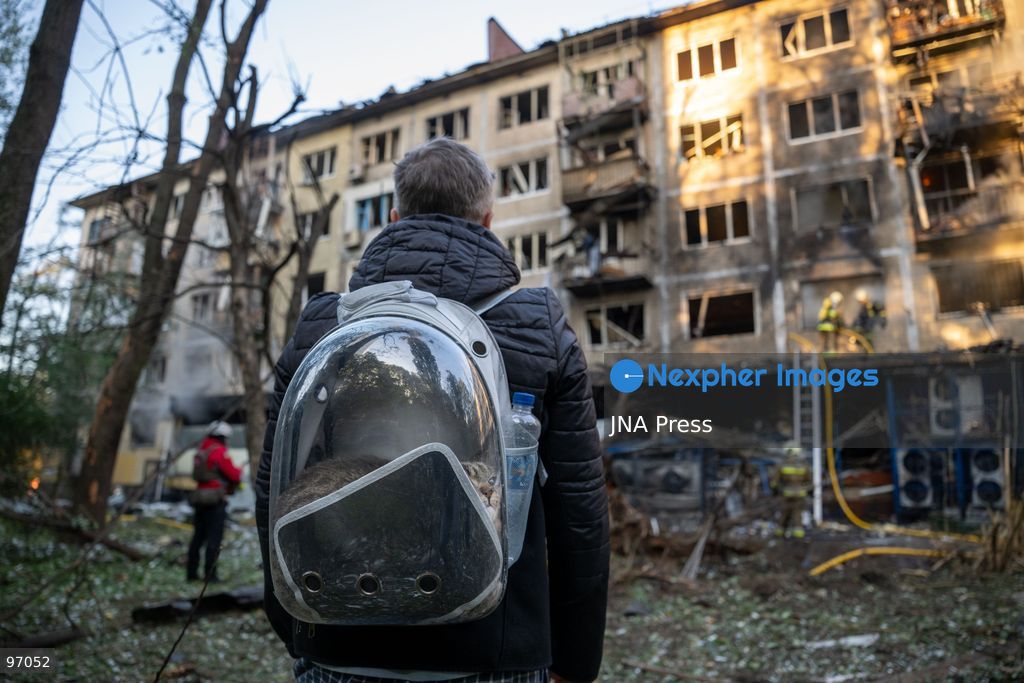 KYIV, UKRAINE, SEPTEMBER 26, 2026: Firefighters work at a five-story residential building damaged during a Russian drone attack in Kyiv’s Solomianskyi district, as residents watch emergency operations and clear shattered glass from the area. Kyiv authorities said a fire broke out at the residential building and a ground-floor shop following the fall of a drone, injuring four people and prompting rescuers to evacuate 20 residents. Photo by Nastasssia Torres / JNA Press. (Photo by Nastassia Kantorowicz Torres/JNA Press via Nexpher Images)
