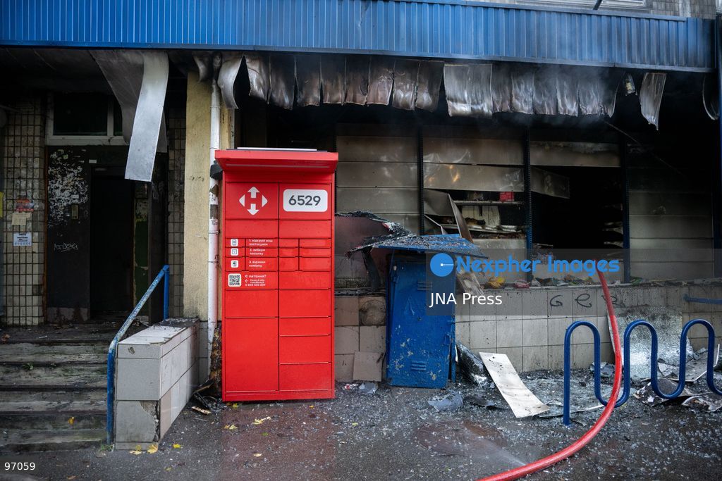 KYIV, UKRAINE, SEPTEMBER 26, 2026: Firefighters work at a five-story residential building damaged during a Russian drone attack in Kyiv’s Solomianskyi district, as residents watch emergency operations and clear shattered glass from the area. Kyiv authorities said a fire broke out at the residential building and a ground-floor shop following the fall of a drone, injuring four people and prompting rescuers to evacuate 20 residents. Photo by Nastasssia Torres / JNA Press. (Photo by Nastassia Kantorowicz Torres/JNA Press via Nexpher Images)
