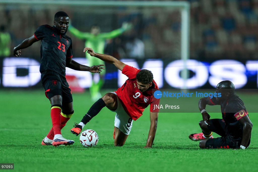 CAIRO, EGYPT, SEPTEMBER 25, 2026: 9 Hamza Abdelkarim of Egypt battle for possession with 3 BUATU MANANGA JONATHAN  and 23 MANUEL LUIS DA SILVA CAFUMANA of Angola during Africa Cup of Nations qualification Group B match between Egypt and Angola at Cairo International Stadium in 25 Sep 2026.Photo by Ayman Aref / JNA Press (Photo by Ayman Aref/JNA Press via Nexpher Images)