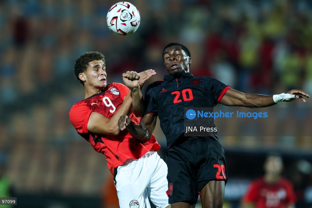 CAIRO, EGYPT, SEPTEMBER 25, 2026: 9 Hamza Abdelkarim of Egypt battle for possession with 20 KELIANO MANUEL of Angola during Africa Cup of Nations qualification Group B match between Egypt and Angola at Cairo International Stadium in 25 Sep 2026.Photo by Ayman Aref / JNA Press (Photo by Ayman Aref/JNA Press via Nexpher Images)