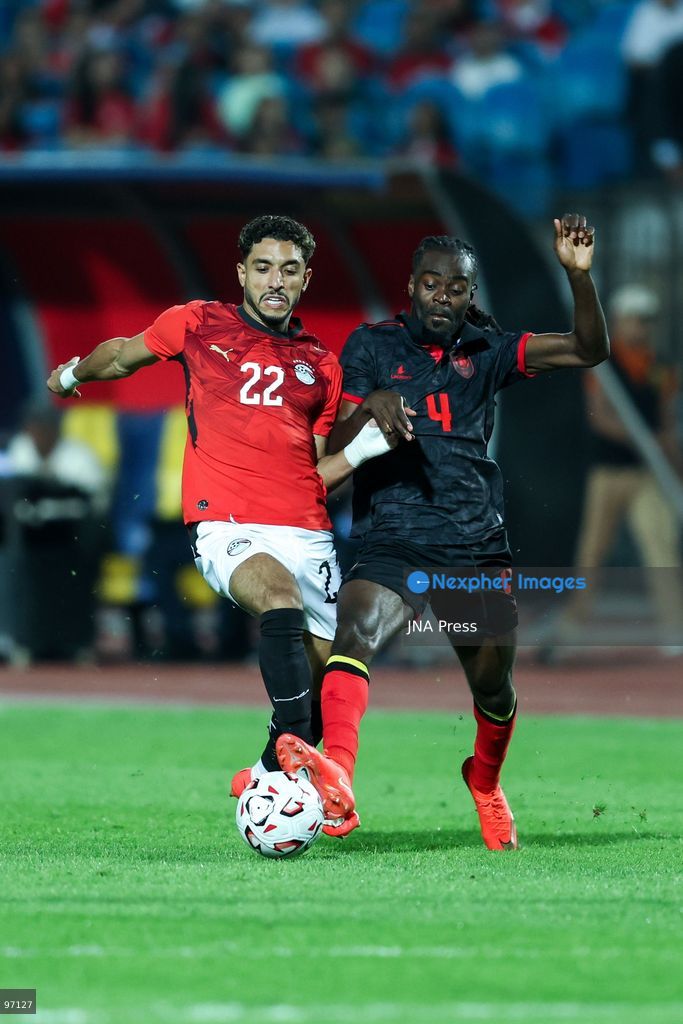CAIRO, EGYPT, SEPTEMBER 25, 2026: 22 Omar Marmoush of Egypt battle for possession with 4 JUNIOR MARSONI SAMBU MANSONI of Angola during Africa Cup of Nations qualification Group B match between Egypt and Angola at Cairo International Stadium in 25 Sep 2026.Photo by Ayman Aref / JNA Press (Photo by Ayman Aref/JNA Press via Nexpher Images)
