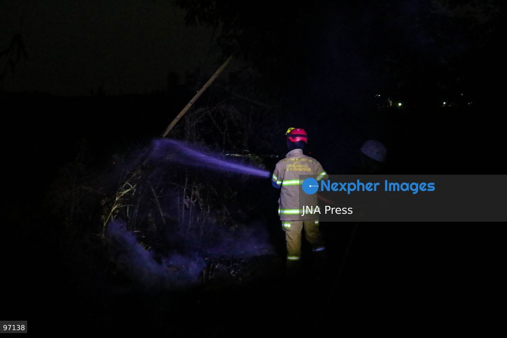 KARANGANYAR, CENTRAL JAVA, INDONESIA, SEPTEMBER 26, 2026: Firefighters work to extinguish a wildfire in Delingan, Karanganyar Regency, Central Java. Personnel from the Karanganyar Fire Department and the Regional Disaster Management Agency (BPBD) carried out firefighting operations to prevent the blaze from spreading toward nearby residential areas. Photo by Ilham Nur Arifin / JNA Press. (Photo by Ilham Nur Arifin/JNA Press via Nexpher Images)