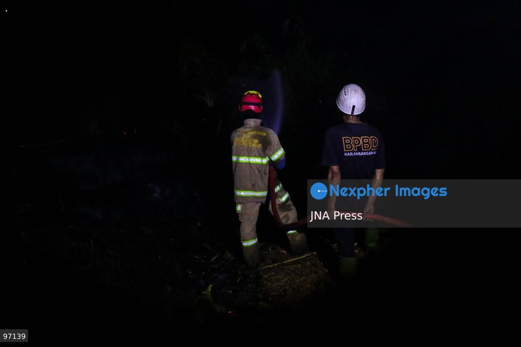 KARANGANYAR, CENTRAL JAVA, INDONESIA, SEPTEMBER 26, 2026: Firefighters work to extinguish a wildfire in Delingan, Karanganyar Regency, Central Java. Personnel from the Karanganyar Fire Department and the Regional Disaster Management Agency (BPBD) carried out firefighting operations to prevent the blaze from spreading toward nearby residential areas. Photo by Ilham Nur Arifin / JNA Press. (Photo by Ilham Nur Arifin/JNA Press via Nexpher Images)