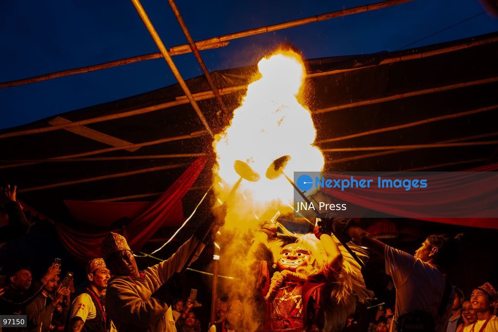 LALITPUR, NEPAL, SEPTEMBER 26, 2026: A performer takes part in the traditional Mipwa Lakhe dance at Gusingal Chowk in Lalitpur during celebrations for Indra Jatra. The Lakhe was taken in procession through several neighborhoods following the distribution of prasad to devotees at Hathu Dyo. The Mipwa Lakhe tradition is distinguished by a performance in which the masked dancer blows fire from a burning torch. Photo by Ghanashyam Shrestha / JNA Press. (Photo by Ghanashyam Shrestha/JNA Press via Nexpher Images)