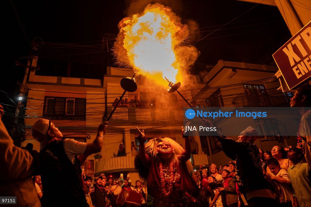 LALITPUR, NEPAL, SEPTEMBER 26, 2026: A performer takes part in the traditional Mipwa Lakhe dance at Gusingal Chowk in Lalitpur during celebrations for Indra Jatra. The Lakhe was taken in procession through several neighborhoods following the distribution of prasad to devotees at Hathu Dyo. The Mipwa Lakhe tradition is distinguished by a performance in which the masked dancer blows fire from a burning torch. Photo by Ghanashyam Shrestha / JNA Press. (Photo by Ghanashyam Shrestha/JNA Press via Nexpher Images)