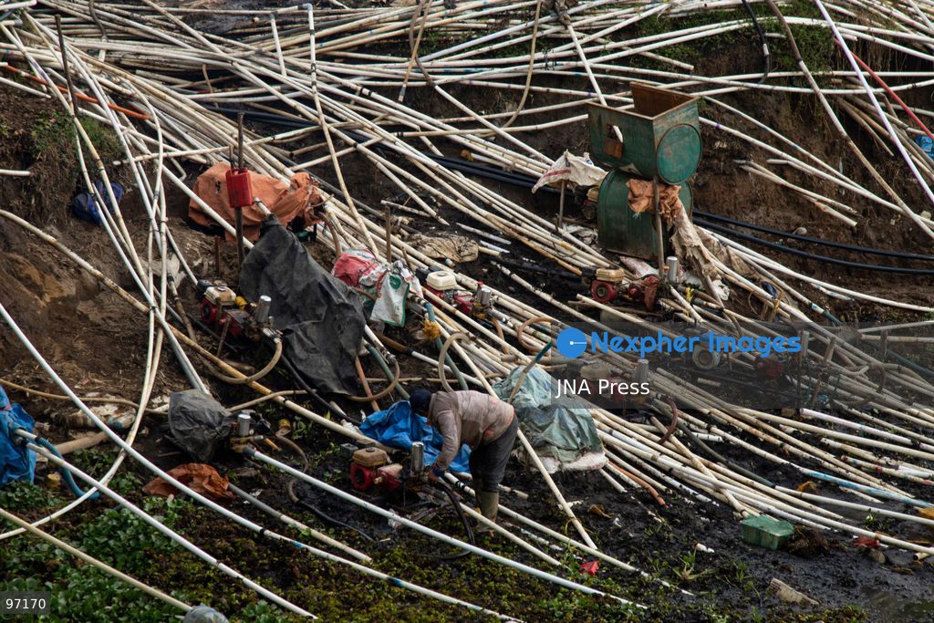 BANJARNEGARA, CENTRAL JAVA, INDONESIA, SEPTEMBER 26, 2026: Farmers use diesel-powered pumps and long hoses to draw water from Telaga Merdada for nearby farmland in Banjarnegara Regency, Central Java. The water level at the lake has dropped by approximately three meters over the past three months, increasing the need for farmers to pump water to irrigate agricultural land. Photo by Topen Anggara/ JNA Press. (Photo by Topen Anggara Saputra/JNA Press via Nexpher Images)