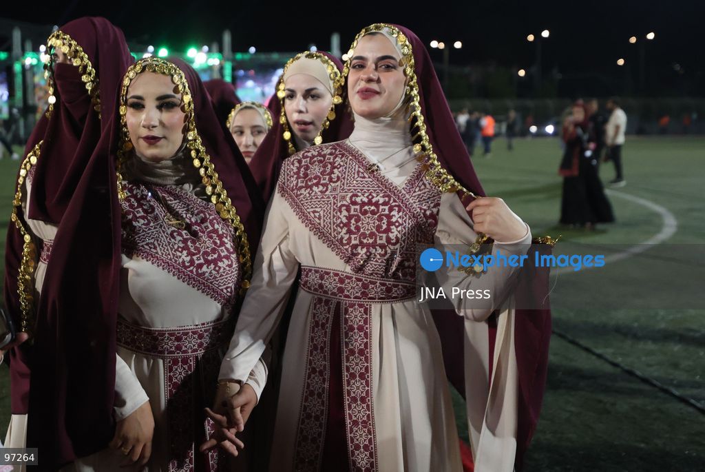 DURA, OCCUPIED WEST BANK, SEPTEMBER 26, 2026: Forty-four Palestinian brides and grooms take part in a mass wedding ceremony in Dura, south of Hebron, with participants wearing traditional Palestinian clothing. Dura Mayor Muhannad Amro said the collective wedding was organized to support couples facing difficult economic conditions amid the continuing impact of the war that began in October 2023. Photo by Mosab Shawer / JNA Press. (Photo by Mosab shawer/JNA Press via Nexpher Images)