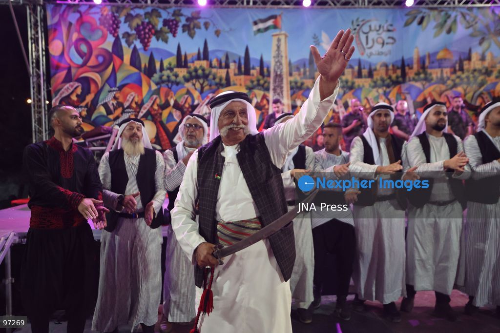 DURA, OCCUPIED WEST BANK, SEPTEMBER 26, 2026: Forty-four Palestinian brides and grooms take part in a mass wedding ceremony in Dura, south of Hebron, with participants wearing traditional Palestinian clothing. Dura Mayor Muhannad Amro said the collective wedding was organized to support couples facing difficult economic conditions amid the continuing impact of the war that began in October 2023. Photo by Mosab Shawer / JNA Press. (Photo by Mosab shawer/JNA Press via Nexpher Images)