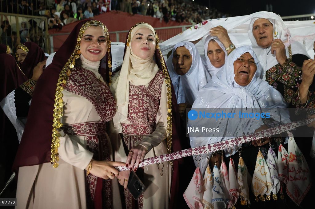 DURA, OCCUPIED WEST BANK, SEPTEMBER 26, 2026: Forty-four Palestinian brides and grooms take part in a mass wedding ceremony in Dura, south of Hebron, with participants wearing traditional Palestinian clothing. Dura Mayor Muhannad Amro said the collective wedding was organized to support couples facing difficult economic conditions amid the continuing impact of the war that began in October 2023. Photo by Mosab Shawer / JNA Press. (Photo by Mosab shawer/JNA Press via Nexpher Images)