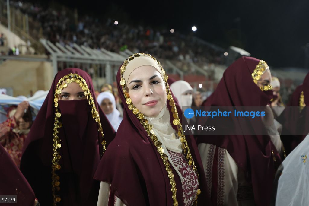 DURA, OCCUPIED WEST BANK, SEPTEMBER 26, 2026: Forty-four Palestinian brides and grooms take part in a mass wedding ceremony in Dura, south of Hebron, with participants wearing traditional Palestinian clothing. Dura Mayor Muhannad Amro said the collective wedding was organized to support couples facing difficult economic conditions amid the continuing impact of the war that began in October 2023. Photo by Mosab Shawer / JNA Press. (Photo by Mosab shawer/JNA Press via Nexpher Images)