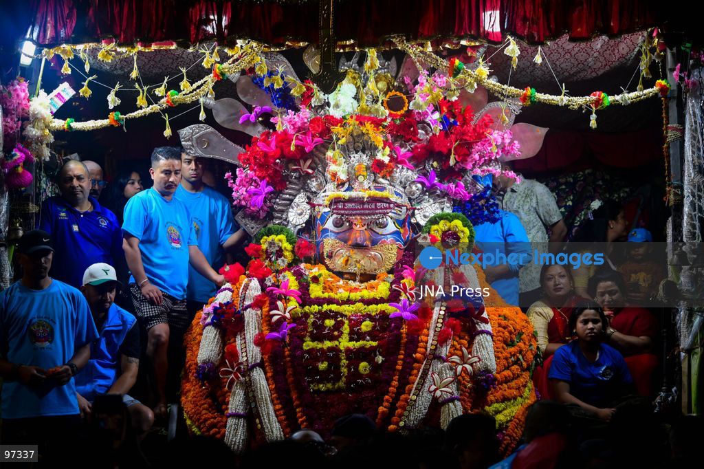 KATHMANDU, NEPAL, SEPTEMBER 26, 2026: Devotees pull chariots carrying Living Goddess Kumari Aryatara Shakya and the living deities Ganesh and Bhairav through the historic streets of Kathmandu during Thaneyā, the second chariot procession of the annual Indra Jatra festival. Large crowds gathered along the northern route of the old city as the three living deities were carried through areas including Asan and Indra Chowk. The celebrations also featured traditional masked dances, Newar music and public displays of deities including Swet Bhairab and Akash Bhairab. This year marks Aryatara Shakya’s first Indra Jatra as Kathmandu’s Living Goddess Kumari. Photo by Safal Prakash Shrestha / JNA Press. (Photo by Safal Prakash Shrestha/JNA Press via Nexpher Images)