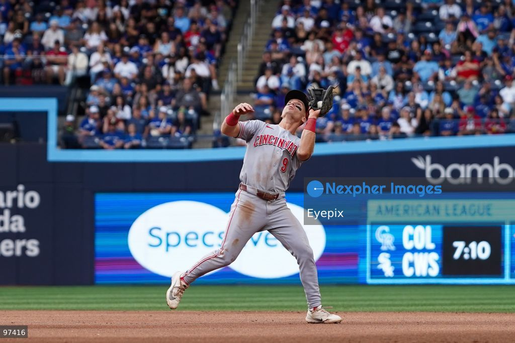 Matt McLain #9 of Cincinnati Reds catches a pop-up during the game against the Toronto Blue Jays at Rogers Centre on September 26, 2026, in Toronto, Ontario, Canada. (Photo by Leonardo Ramirez/ Eyepix Group) (Photo by Leonardo Ramirez/ Eyepix Group/Eyepix via Nexpher Images)