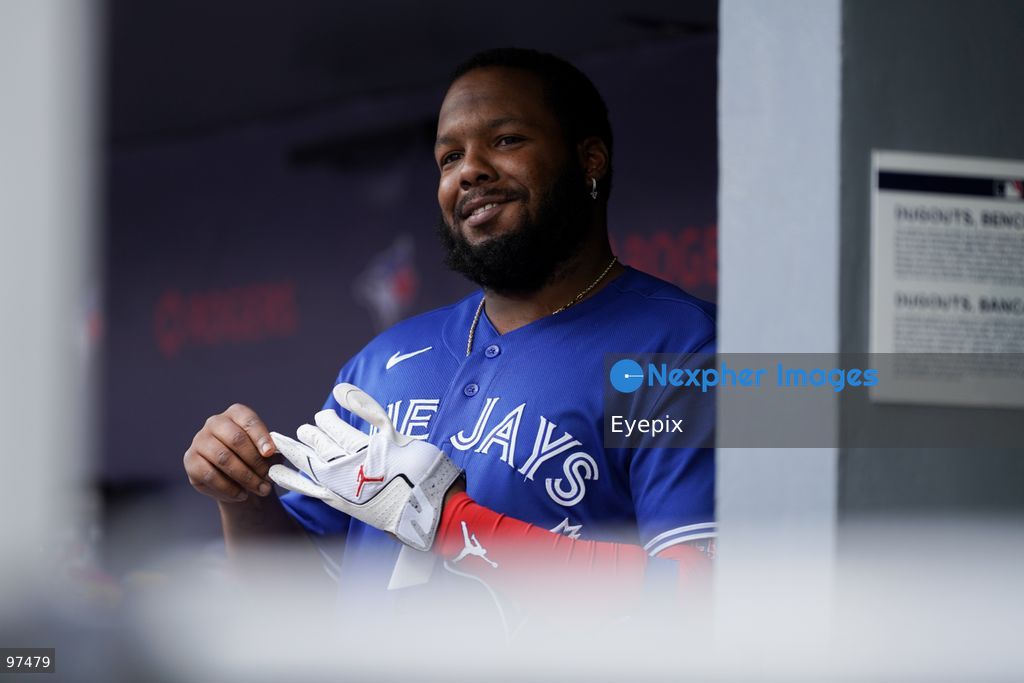 Vladimir Guerrero Jr. #27 of the Toronto Blue Jays looks on from the dugout during the game against the Cincinnati Reds at Rogers Centre on September 26, 2026, in Toronto, Ontario, Canada. (Photo by Leonardo Ramirez/ Eyepix Group) (Photo by Leonardo Ramirez/ Eyepix Group/Eyepix via Nexpher Images)