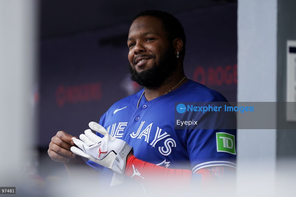 Vladimir Guerrero Jr. #27 of the Toronto Blue Jays looks on from the dugout during the game against the Cincinnati Reds at Rogers Centre on September 26, 2026, in Toronto, Ontario, Canada. (Photo by Leonardo Ramirez/ Eyepix Group) (Photo by Leonardo Ramirez/ Eyepix Group/Eyepix via Nexpher Images)