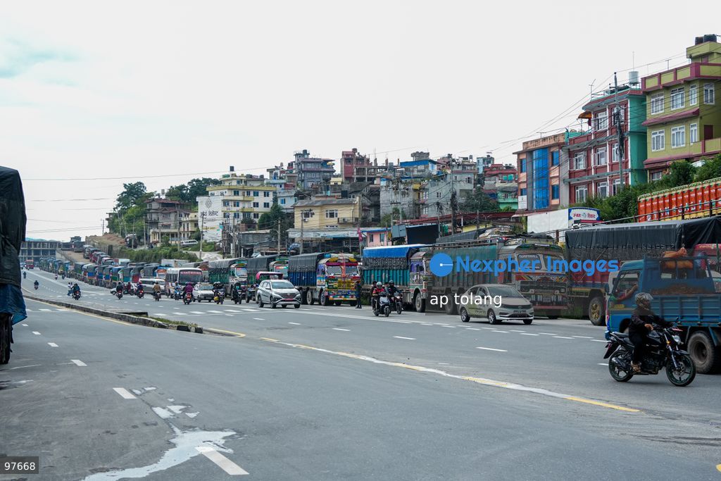 KATHMANDU, NEPAL —September 26, 2026: Transportation vehicles wait along the Ring Road as the Prithivi Highway remains blocked by a landslide, disrupting traffic in Kathmandu, Nepal. (Photo by ap tolang/Nexpher Images)