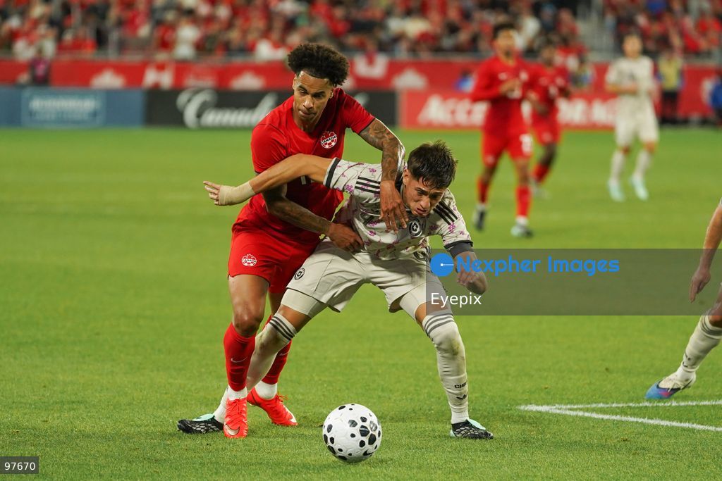 Tajon Buchanan #17 of Canada and Iván Román #04 of Chile battle for the ball during the International Friendly match between Canada and Chile at BMO Filed. on September 26, 2026 in Toronto, Ontario. (Photo by Leonardo Ramirez/ Eyepix Group) (Photo by Leonardo Ramirez/ Eyepix Group/Eyepix via Nexpher Images)