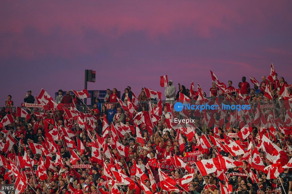 Canadian fans waving Canada flags before the International Friendly match between Canada and Chile at BMO Filed. on September 26, 2026 in Toronto, Ontario. (Photo by Leonardo Ramirez/ Eyepix Group) (Photo by Leonardo Ramirez/ Eyepix Group/Eyepix via Nexpher Images)