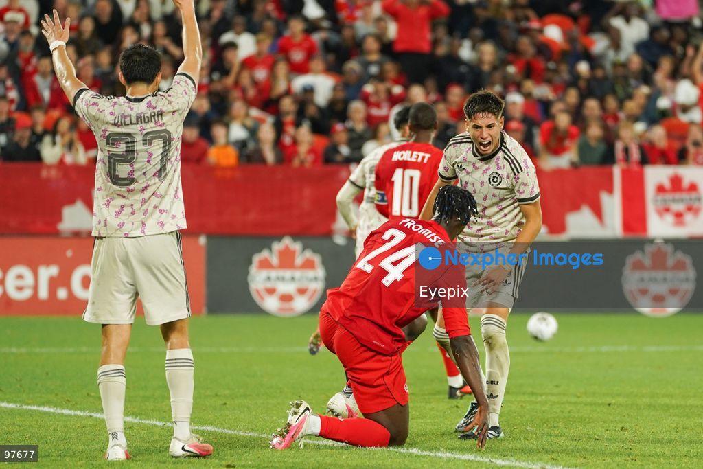 Iván Román #04 of Chile reacts against Promise David #24 of Canada during the International Friendly match between Canada and Chile at BMO Filed. on September 26, 2026 in Toronto, Ontario. (Photo by Leonardo Ramirez/ Eyepix Group) (Photo by Leonardo Ramirez/ Eyepix Group/Eyepix via Nexpher Images)