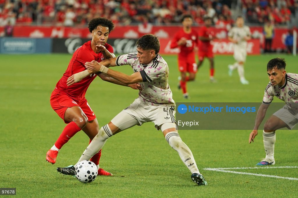 Tajon Buchanan #17 of Canada and Iván Román #04 of Chile battle for the ball during the International Friendly match between Canada and Chile at BMO Filed. on September 26, 2026 in Toronto, Ontario. (Photo by Leonardo Ramirez/ Eyepix Group) (Photo by Leonardo Ramirez/ Eyepix Group/Eyepix via Nexpher Images)
