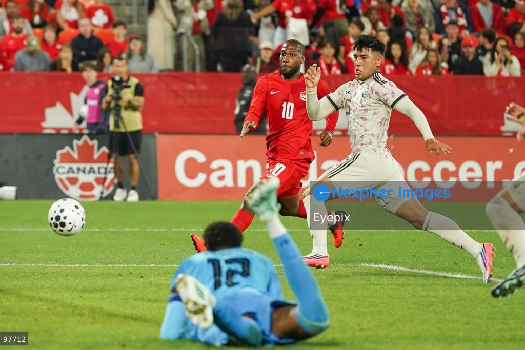 Junior Hoilett #10 of Canada and Gonzalo Tapia #16 of Chile battle for the ball after Lawrence Vigouroux #12 of Chile saves the ball during the International Friendly match between Canada and Chile at BMO Filed. on September 26, 2026 in Toronto, Ontario. (Photo by Leonardo Ramirez/ Eyepix Group) (Photo by Leonardo Ramirez/ Eyepix Group/Eyepix via Nexpher Images)
