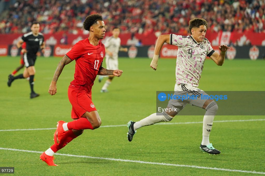 Tajon Buchanan #17 of Canada and Iván Román #04 of Chile battle for the ball during the International Friendly match between Canada and Chile at BMO Filed. on September 26, 2026 in Toronto, Ontario. (Photo by Leonardo Ramirez/ Eyepix Group) (Photo by Leonardo Ramirez/ Eyepix Group/Eyepix via Nexpher Images)