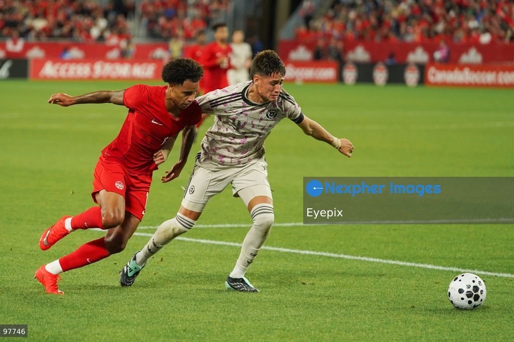 Tajon Buchanan #17 of Canada and Iván Román #04 of Chile battle for the ball during the International Friendly match between Canada and Chile at BMO Filed. on September 26, 2026 in Toronto, Ontario. (Photo by Leonardo Ramirez/ Eyepix Group) (Photo by Leonardo Ramirez/ Eyepix Group/Eyepix via Nexpher Images)