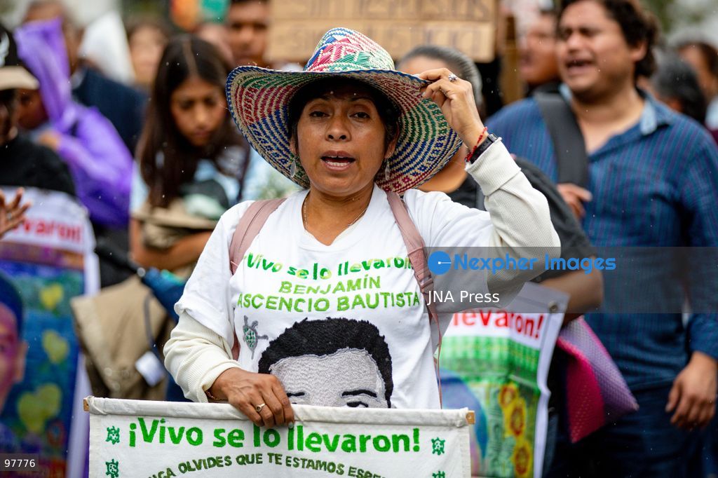 MEXICO CITY, MEXICO, SEPTEMBER 26, 2026: Families of the 43 missing Ayotzinapa students, students and human rights activists march through Mexico City to mark the 12th anniversary of the students’ disappearance and demand truth and justice. Thousands of demonstrators marched from the Ángel de la Independencia to the Zócalo, carrying photographs of the missing students and banners calling for answers over their fate. The 43 students from the Raúl Isidro Burgos Rural Teachers’ College disappeared in Iguala, Guerrero, on the night of September 26, 2014, and the case remains unresolved. Photo by Addi Setyawan / JNA Press. (Photo by addi setyawan/JNA Press via Nexpher Images)