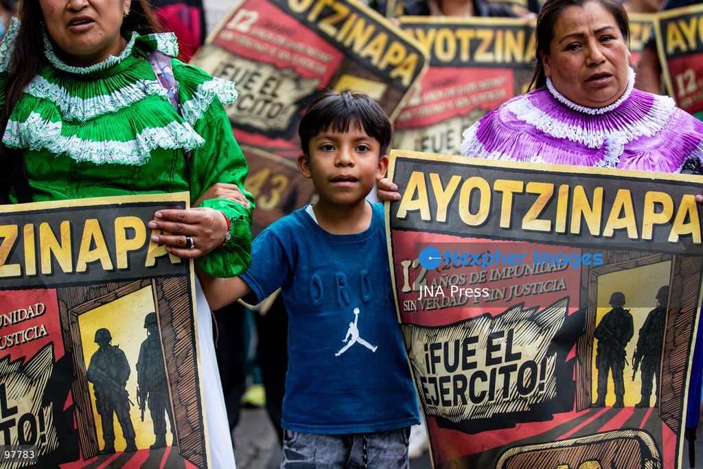 MEXICO CITY, MEXICO, SEPTEMBER 26, 2026: Families of the 43 missing Ayotzinapa students, students and human rights activists march through Mexico City to mark the 12th anniversary of the students’ disappearance and demand truth and justice. Thousands of demonstrators marched from the Ángel de la Independencia to the Zócalo, carrying photographs of the missing students and banners calling for answers over their fate. The 43 students from the Raúl Isidro Burgos Rural Teachers’ College disappeared in Iguala, Guerrero, on the night of September 26, 2014, and the case remains unresolved. Photo by Addi Setyawan / JNA Press. (Photo by addi setyawan/JNA Press via Nexpher Images)