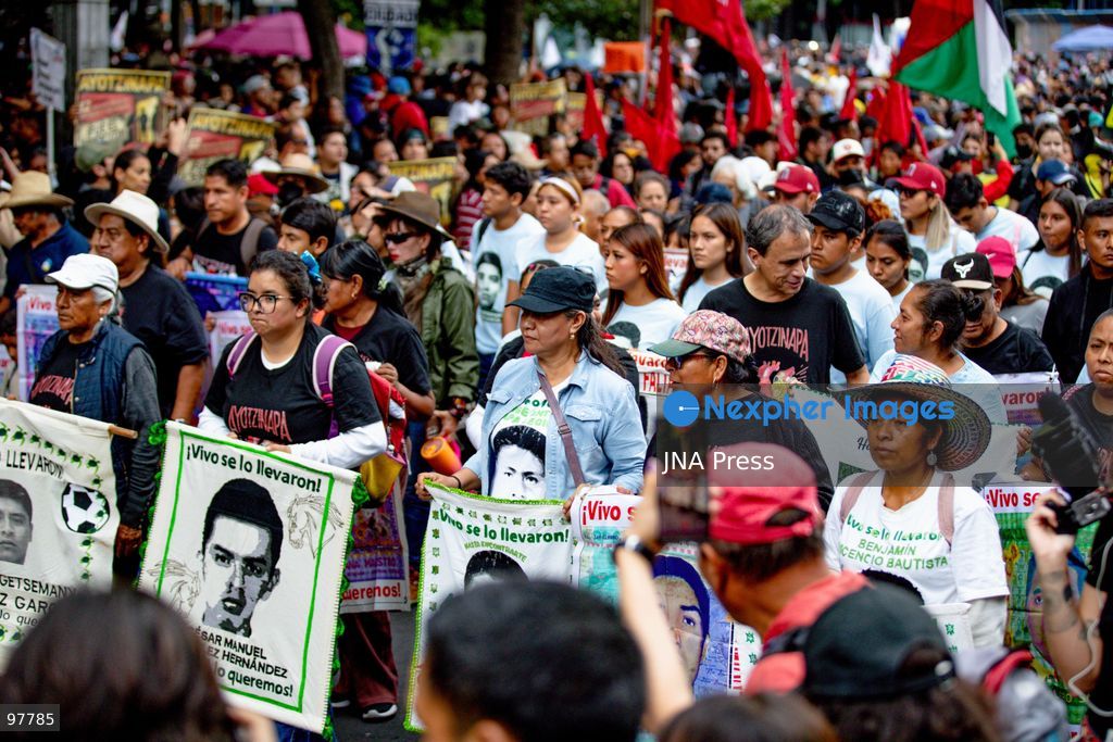 MEXICO CITY, MEXICO, SEPTEMBER 26, 2026: Families of the 43 missing Ayotzinapa students, students and human rights activists march through Mexico City to mark the 12th anniversary of the students’ disappearance and demand truth and justice. Thousands of demonstrators marched from the Ángel de la Independencia to the Zócalo, carrying photographs of the missing students and banners calling for answers over their fate. The 43 students from the Raúl Isidro Burgos Rural Teachers’ College disappeared in Iguala, Guerrero, on the night of September 26, 2014, and the case remains unresolved. Photo by Addi Setyawan / JNA Press. (Photo by addi setyawan/JNA Press via Nexpher Images)