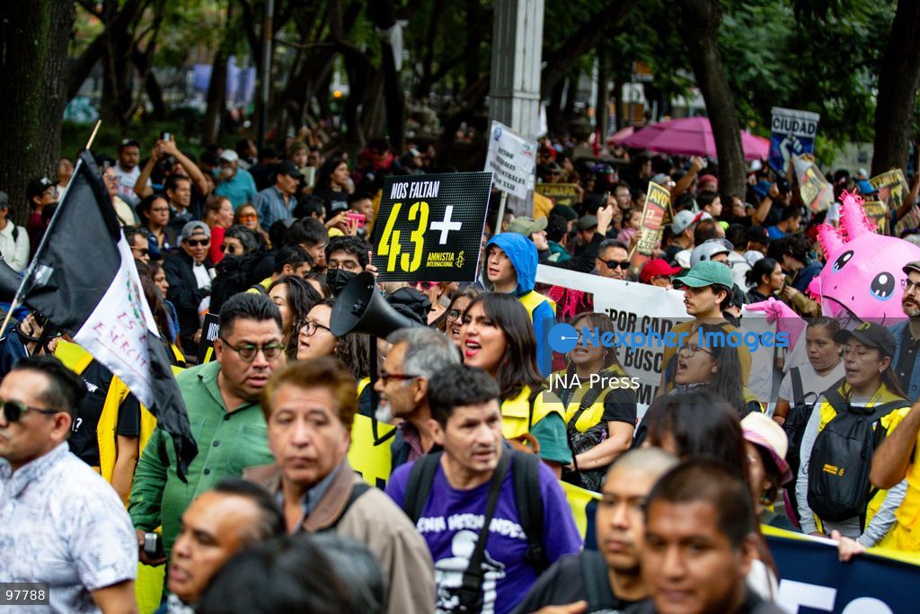 MEXICO CITY, MEXICO, SEPTEMBER 26, 2026: Families of the 43 missing Ayotzinapa students, students and human rights activists march through Mexico City to mark the 12th anniversary of the students’ disappearance and demand truth and justice. Thousands of demonstrators marched from the Ángel de la Independencia to the Zócalo, carrying photographs of the missing students and banners calling for answers over their fate. The 43 students from the Raúl Isidro Burgos Rural Teachers’ College disappeared in Iguala, Guerrero, on the night of September 26, 2014, and the case remains unresolved. Photo by Addi Setyawan / JNA Press. (Photo by addi setyawan/JNA Press via Nexpher Images)