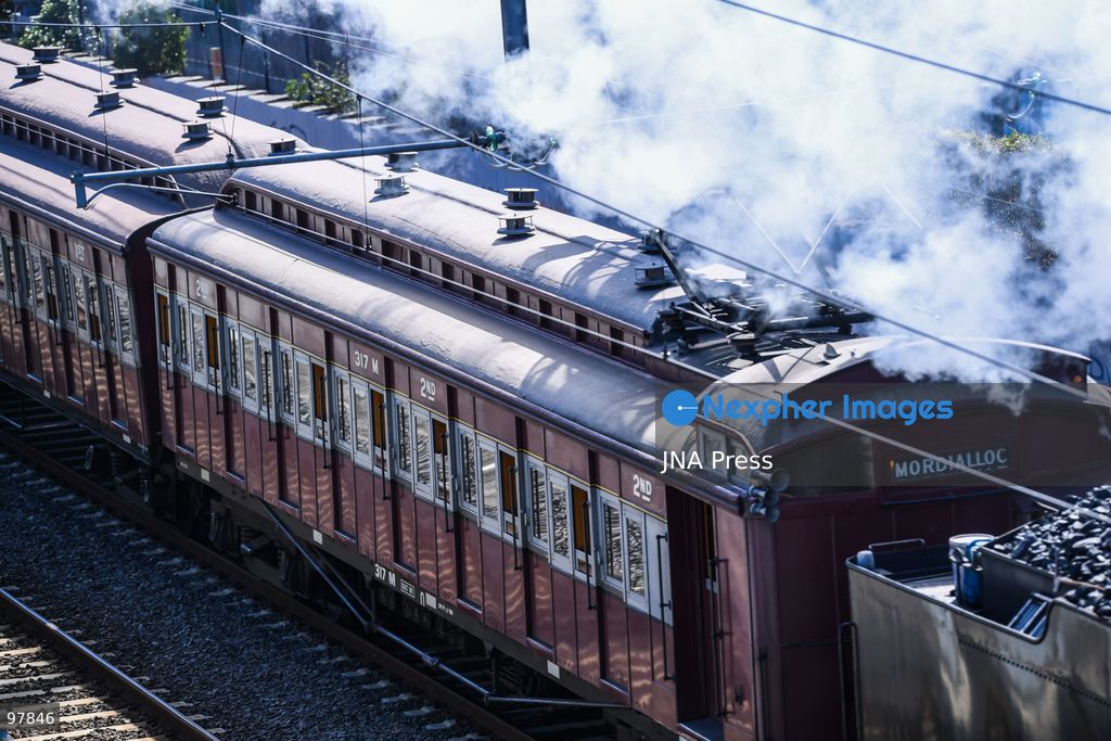 MELBOURNE, AUSTRALIA, SEPTEMBER 27, 2026: A historic A2 986 steam locomotive, built in 1915, pulls wooden Red Rattler carriages dating from 1908 along Melbourne’s Frankston line during a heritage rail journey organized by Steamrail Victoria. The special service gives passengers an opportunity to travel aboard preserved rolling stock from Victoria’s railway history. Photo by Alexander Bogatyrev / JNA Press. (Photo by Alexander Bogatyrev/JNA Press via Nexpher Images)