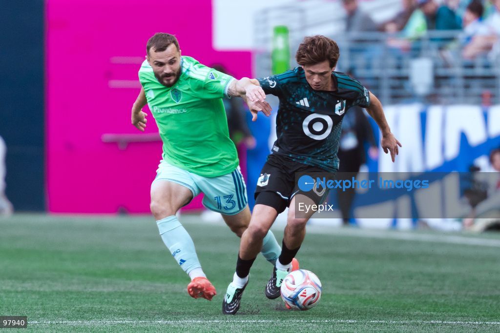 Wil Trapp #20 of Minnesota United FC and Jordan Morris #13 of Seattle Sounders FC battle for the ball during the MLS match between Sounders FC and Minnesota United FC at Lumen Field. on September 26, 2026 in Seattle, Washington. (Photo by Jules Doyle/ Eyepix Group) (Photo by Jules Doyle / Eyepix Group/Eyepix via Nexpher Images)