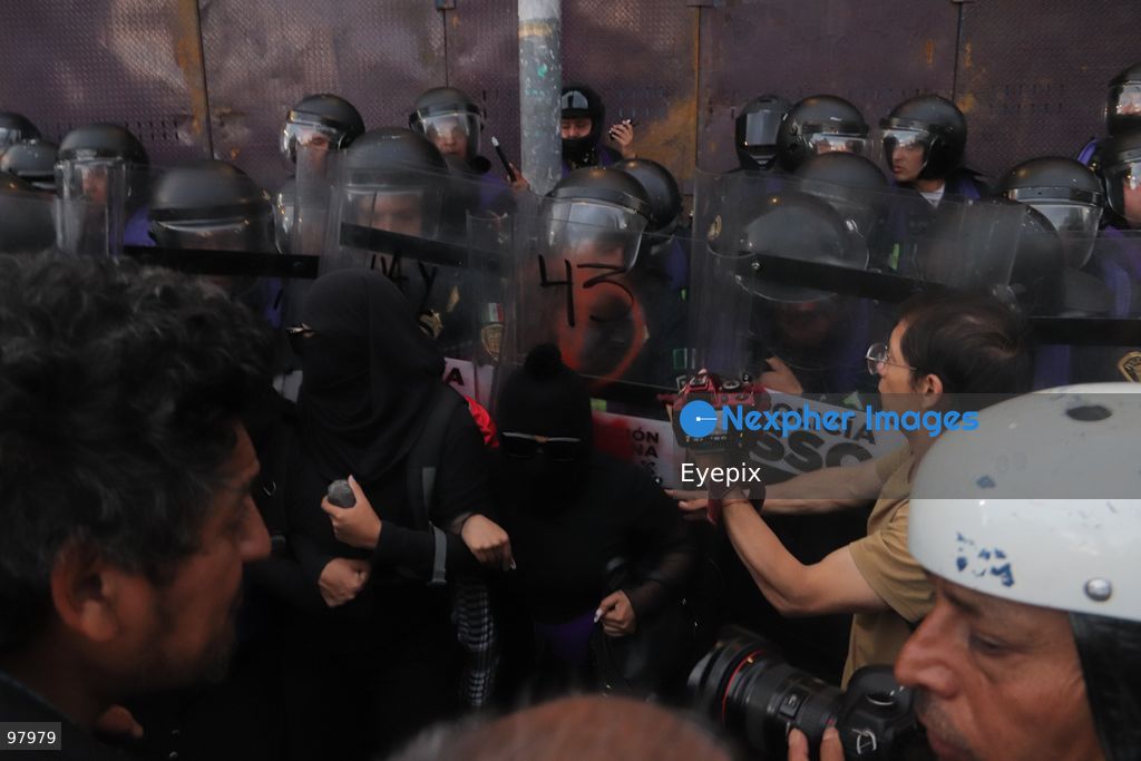 Riot police officers hold protective shields during a rally to demand justice and truth on the 12th anniversary of the disappearance of the 43 students, in Mexico City, Mexico on September 26, 2026. (Photo by Carlos Santiago/ Eyepix Group) (Photo by Carlos Santiago/ Eyepix Group/Eyepix via Nexpher Images)