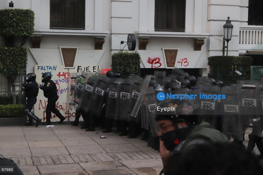 Riot police officers hold protective shields during a rally to demand justice and truth on the 12th anniversary of the disappearance of the 43 students, in Mexico City, Mexico on September 26, 2026. (Photo by Carlos Santiago/ Eyepix Group) (Photo by Carlos Santiago/ Eyepix Group/Eyepix via Nexpher Images)