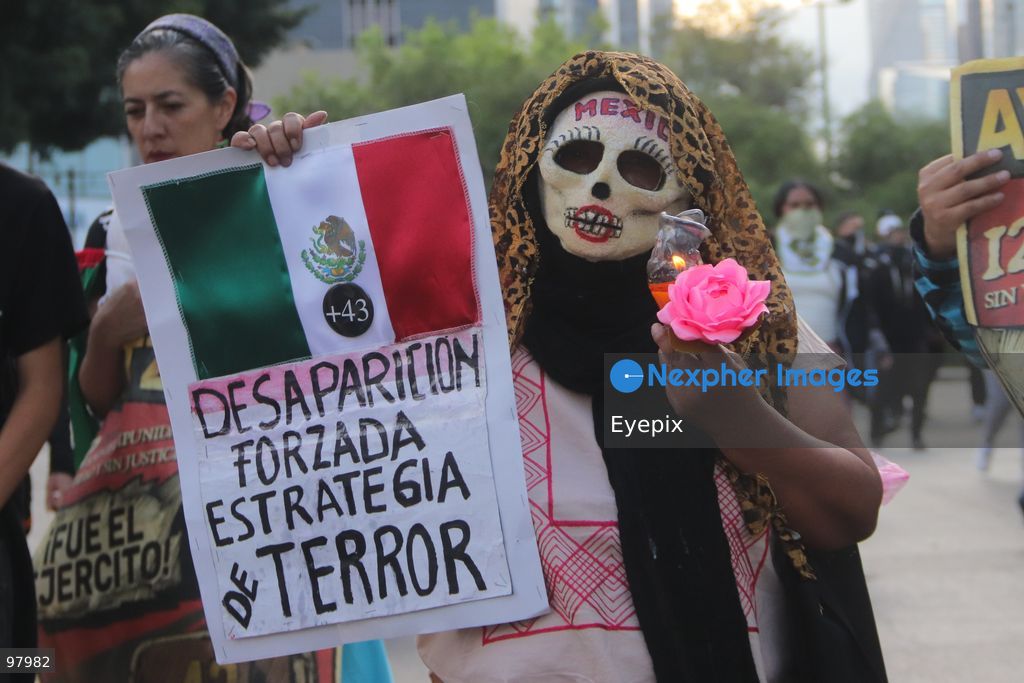 Persons march during a rally to demand justice and truth on the 12th anniversary of the disappearance of the 43 students, in Mexico City, Mexico on September 26, 2026. (Photo by Carlos Santiago/ Eyepix Group) (Photo by Carlos Santiago/ Eyepix Group/Eyepix via Nexpher Images)
