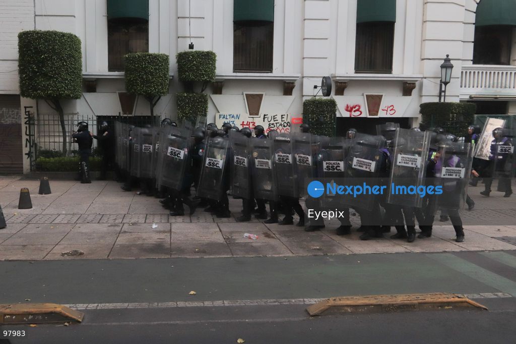Riot police officers hold protective shields during a rally to demand justice and truth on the 12th anniversary of the disappearance of the 43 students, in Mexico City, Mexico on September 26, 2026. (Photo by Carlos Santiago/ Eyepix Group) (Photo by Carlos Santiago/ Eyepix Group/Eyepix via Nexpher Images)