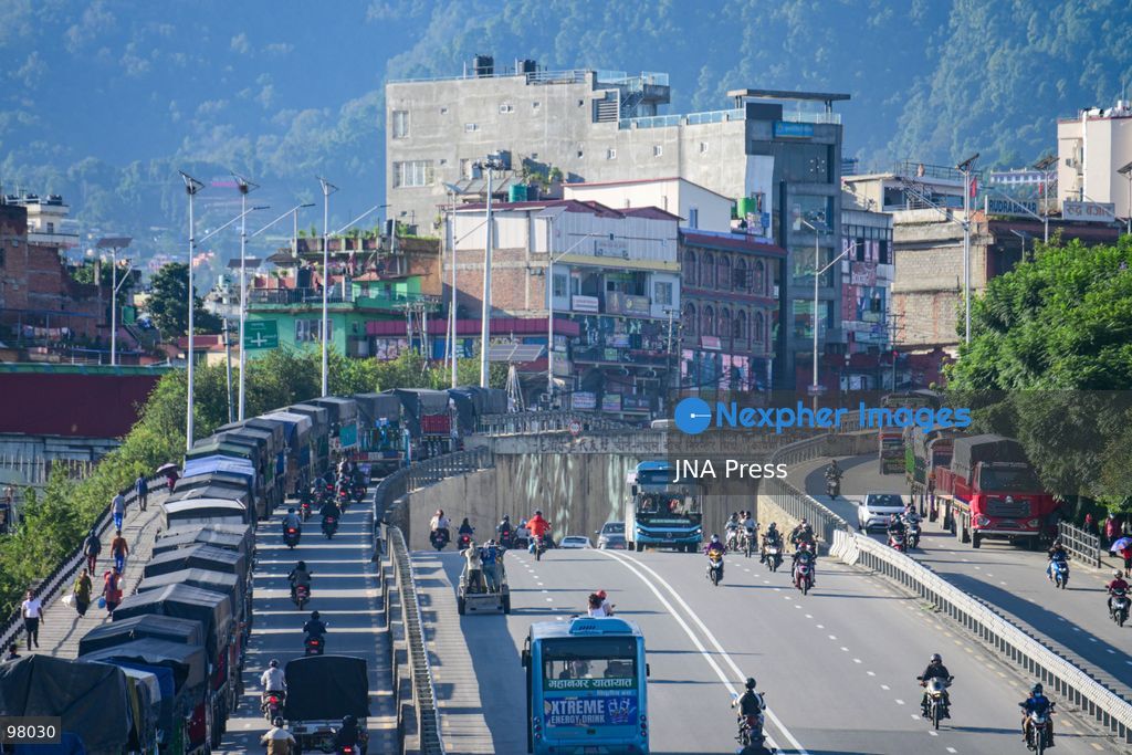 KATHMANDU, NEPAL – SEPTEMBER 27, 2026: Vehicles remained stranded along the Ring Road at Kalanki, a major gateway from Kathmandu toward Naubise and Naagdhunga, as the Prithvi Highway and other major routes remained disrupted by landslides and flooding following several days of continuous heavy rainfall. Rain since September 24 triggered landslides, road erosion and flooding at multiple locations, repeatedly blocking sections of the Prithvi Highway and leaving vehicles and passengers stranded. The highway was affected by landslides at locations including Krishnabhir, Chaukibhir, Jawang Khola and Fisling. The disruption created difficulties for long-distance drivers and passengers waiting in and around Kathmandu, with some remaining with their vehicles for extended periods while waiting for roads to reopen. Floods, landslides and road damage also affected other highways connecting Kathmandu with different parts of Nepal. Photo by Safal Prakash Shrestha / JNA Press (Photo by Safal Prakash Shrestha/JNA Press via Nexpher Images)
