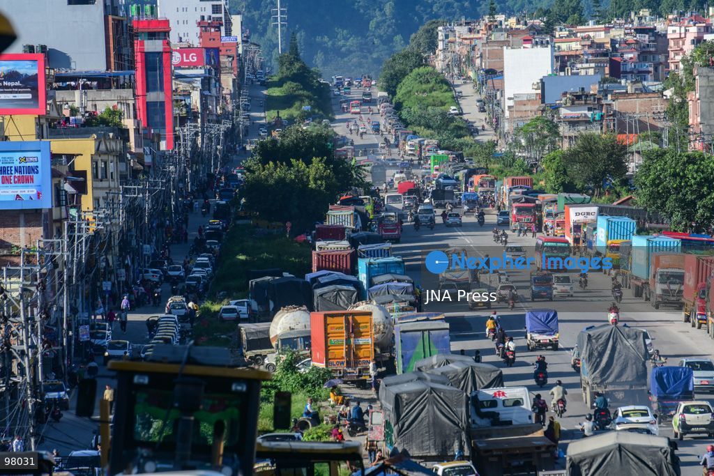 KATHMANDU, NEPAL – SEPTEMBER 27, 2026: Vehicles remained stranded along the Ring Road at Kalanki, a major gateway from Kathmandu toward Naubise and Naagdhunga, as the Prithvi Highway and other major routes remained disrupted by landslides and flooding following several days of continuous heavy rainfall. Rain since September 24 triggered landslides, road erosion and flooding at multiple locations, repeatedly blocking sections of the Prithvi Highway and leaving vehicles and passengers stranded. The highway was affected by landslides at locations including Krishnabhir, Chaukibhir, Jawang Khola and Fisling. The disruption created difficulties for long-distance drivers and passengers waiting in and around Kathmandu, with some remaining with their vehicles for extended periods while waiting for roads to reopen. Floods, landslides and road damage also affected other highways connecting Kathmandu with different parts of Nepal. Photo by Safal Prakash Shrestha / JNA Press (Photo by Safal Prakash Shrestha/JNA Press via Nexpher Images)