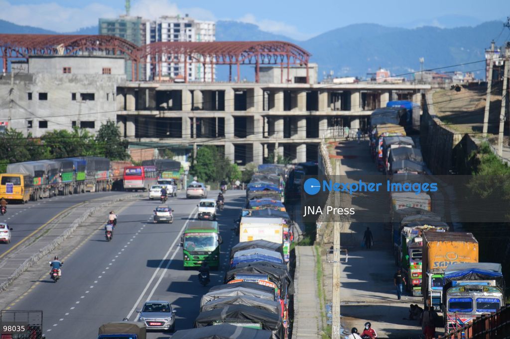 KATHMANDU, NEPAL – SEPTEMBER 27, 2026: Vehicles remained stranded along the Ring Road at Kalanki, a major gateway from Kathmandu toward Naubise and Naagdhunga, as the Prithvi Highway and other major routes remained disrupted by landslides and flooding following several days of continuous heavy rainfall. Rain since September 24 triggered landslides, road erosion and flooding at multiple locations, repeatedly blocking sections of the Prithvi Highway and leaving vehicles and passengers stranded. The highway was affected by landslides at locations including Krishnabhir, Chaukibhir, Jawang Khola and Fisling. The disruption created difficulties for long-distance drivers and passengers waiting in and around Kathmandu, with some remaining with their vehicles for extended periods while waiting for roads to reopen. Floods, landslides and road damage also affected other highways connecting Kathmandu with different parts of Nepal. Photo by Safal Prakash Shrestha / JNA Press (Photo by Safal Prakash Shrestha/JNA Press via Nexpher Images)