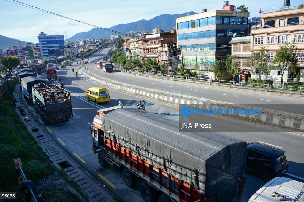 KATHMANDU, NEPAL – SEPTEMBER 27, 2026: Vehicles remained stranded along the Ring Road at Kalanki, a major gateway from Kathmandu toward Naubise and Naagdhunga, as the Prithvi Highway and other major routes remained disrupted by landslides and flooding following several days of continuous heavy rainfall. Rain since September 24 triggered landslides, road erosion and flooding at multiple locations, repeatedly blocking sections of the Prithvi Highway and leaving vehicles and passengers stranded. The highway was affected by landslides at locations including Krishnabhir, Chaukibhir, Jawang Khola and Fisling. The disruption created difficulties for long-distance drivers and passengers waiting in and around Kathmandu, with some remaining with their vehicles for extended periods while waiting for roads to reopen. Floods, landslides and road damage also affected other highways connecting Kathmandu with different parts of Nepal. Photo by Safal Prakash Shrestha / JNA Press (Photo by Safal Prakash Shrestha/JNA Press via Nexpher Images)