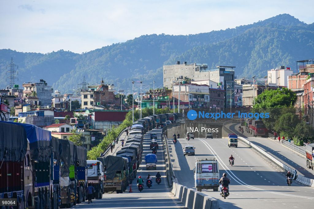 KATHMANDU, NEPAL – SEPTEMBER 27, 2026: Vehicles remained stranded along the Ring Road at Kalanki, a major gateway from Kathmandu toward Naubise and Naagdhunga, as the Prithvi Highway and other major routes remained disrupted by landslides and flooding following several days of continuous heavy rainfall. Rain since September 24 triggered landslides, road erosion and flooding at multiple locations, repeatedly blocking sections of the Prithvi Highway and leaving vehicles and passengers stranded. The highway was affected by landslides at locations including Krishnabhir, Chaukibhir, Jawang Khola and Fisling. The disruption created difficulties for long-distance drivers and passengers waiting in and around Kathmandu, with some remaining with their vehicles for extended periods while waiting for roads to reopen. Floods, landslides and road damage also affected other highways connecting Kathmandu with different parts of Nepal. Photo by Safal Prakash Shrestha / JNA Press (Photo by Safal Prakash Shrestha/JNA Press via Nexpher Images)