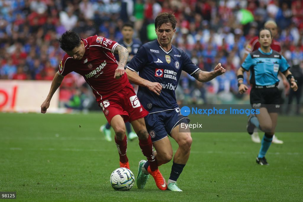 Pavel Perez #15 of Toluca is pressured by Agustin Palavecino #8 of Cruz Azul during the 10th round match between Cruz Azul and Toluca as part of the Torneo Apertura 2026 Liga MX at Banorte Stadium on September 26, 2026 in Mexico City, Mexico. Final Score Cruz Azul 3-3 Toluca. (Photo by Ismael Rosas/ Eyepix Group) (Photo by Ismael Rosas/ Eyepix Group/Eyepix via Nexpher Images)