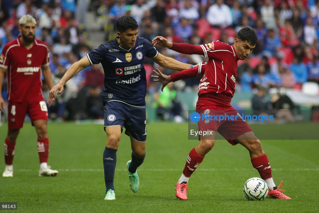 Diego Barbosa #2 of Toluca is pressured by Nicolas Ibañez #7 of Cruz Azul during the 10th round match between Cruz Azul and Toluca as part of the Torneo Apertura 2026 Liga MX at Banorte Stadium on September 26, 2026 in Mexico City, Mexico. Final Score Cruz Azul 3-3 Toluca. (Photo by Ismael Rosas/ Eyepix Group) (Photo by Ismael Rosas/ Eyepix Group/Eyepix via Nexpher Images)