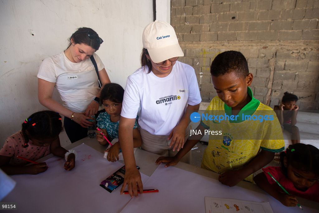 LA GUAIRA, VENEZUELA – SEPTEMBER 27, 2026: Survivors of the twin earthquakes that struck La Guaira state continued living in tents around damaged buildings three months after the earthquakes. Non-governmental organizations provided residents with water and food, while schooling was provided for children living in the affected area. The earthquake survivors continued their daily lives in temporary shelters as they received humanitarian assistance. The situation reflected the ongoing impact of the earthquakes on residents whose homes and surrounding buildings were damaged. Photo by Marcos Adrian Gandica / JNA Press. (Photo by Marcos Adrian Gandica/JNA Press via Nexpher Images)