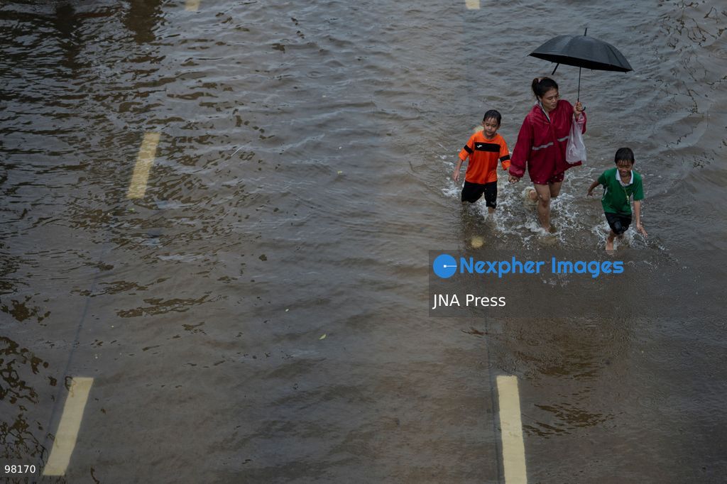 BANGKOK, THAILAND – SEPTEMBER 27, 2026: Heavy rain caused widespread flooding across Bangkok, affecting residents, businesses and communities across the capital. The Thai Meteorological Department attributed the rainfall to a low-pressure system over the Central region combined with the southwest monsoon, with further rain expected through September 27. Bangkok authorities declared all 50 districts disaster-affected areas and deployed pumps, shelters and emergency teams to assist affected residents and drain accumulated floodwater. By Sunday, water levels had begun to recede in some areas, although flooding persisted in several low-lying communities as authorities continued monitoring water levels and providing assistance. Photo by Captain Jirathummanuwat / JNA Press. (Photo by Captain Jirathummanuwat/JNA Press via Nexpher Images)