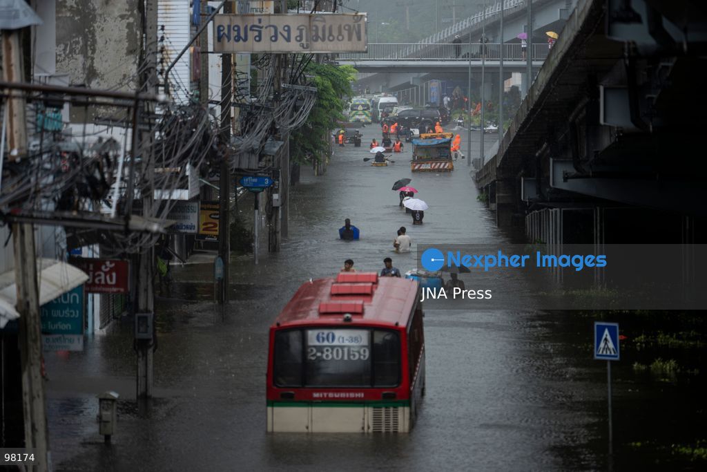 BANGKOK, THAILAND – SEPTEMBER 27, 2026: Heavy rain caused widespread flooding across Bangkok, affecting residents, businesses and communities across the capital. The Thai Meteorological Department attributed the rainfall to a low-pressure system over the Central region combined with the southwest monsoon, with further rain expected through September 27. Bangkok authorities declared all 50 districts disaster-affected areas and deployed pumps, shelters and emergency teams to assist affected residents and drain accumulated floodwater. By Sunday, water levels had begun to recede in some areas, although flooding persisted in several low-lying communities as authorities continued monitoring water levels and providing assistance. Photo by Captain Jirathummanuwat / JNA Press. (Photo by Captain Jirathummanuwat/JNA Press via Nexpher Images)