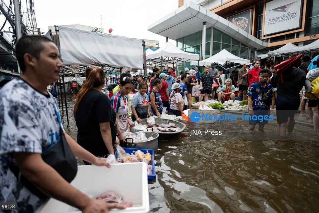 BANGKOK, THAILAND – SEPTEMBER 27, 2026: Heavy rain caused widespread flooding across Bangkok, affecting residents, businesses and communities across the capital. The Thai Meteorological Department attributed the rainfall to a low-pressure system over the Central region combined with the southwest monsoon, with further rain expected through September 27. Bangkok authorities declared all 50 districts disaster-affected areas and deployed pumps, shelters and emergency teams to assist affected residents and drain accumulated floodwater. By Sunday, water levels had begun to recede in some areas, although flooding persisted in several low-lying communities as authorities continued monitoring water levels and providing assistance. Photo by Captain Jirathummanuwat / JNA Press. (Photo by Captain Jirathummanuwat/JNA Press via Nexpher Images)