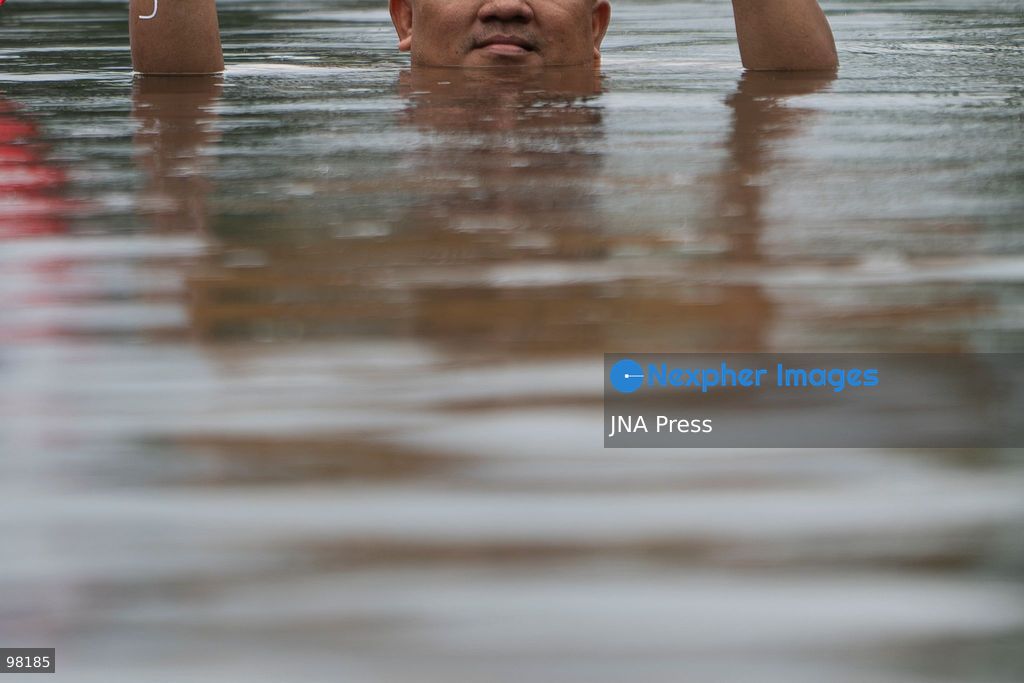 BANGKOK, THAILAND – SEPTEMBER 27, 2026: Heavy rain caused widespread flooding across Bangkok, affecting residents, businesses and communities across the capital. The Thai Meteorological Department attributed the rainfall to a low-pressure system over the Central region combined with the southwest monsoon, with further rain expected through September 27. Bangkok authorities declared all 50 districts disaster-affected areas and deployed pumps, shelters and emergency teams to assist affected residents and drain accumulated floodwater. By Sunday, water levels had begun to recede in some areas, although flooding persisted in several low-lying communities as authorities continued monitoring water levels and providing assistance. Photo by Captain Jirathummanuwat / JNA Press. (Photo by Captain Jirathummanuwat/JNA Press via Nexpher Images)
