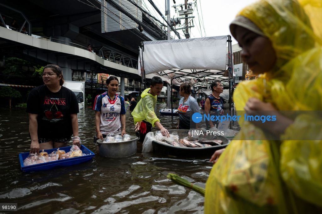 BANGKOK, THAILAND – SEPTEMBER 27, 2026: Heavy rain caused widespread flooding across Bangkok, affecting residents, businesses and communities across the capital. The Thai Meteorological Department attributed the rainfall to a low-pressure system over the Central region combined with the southwest monsoon, with further rain expected through September 27. Bangkok authorities declared all 50 districts disaster-affected areas and deployed pumps, shelters and emergency teams to assist affected residents and drain accumulated floodwater. By Sunday, water levels had begun to recede in some areas, although flooding persisted in several low-lying communities as authorities continued monitoring water levels and providing assistance. Photo by Captain Jirathummanuwat / JNA Press. (Photo by Captain Jirathummanuwat/JNA Press via Nexpher Images)